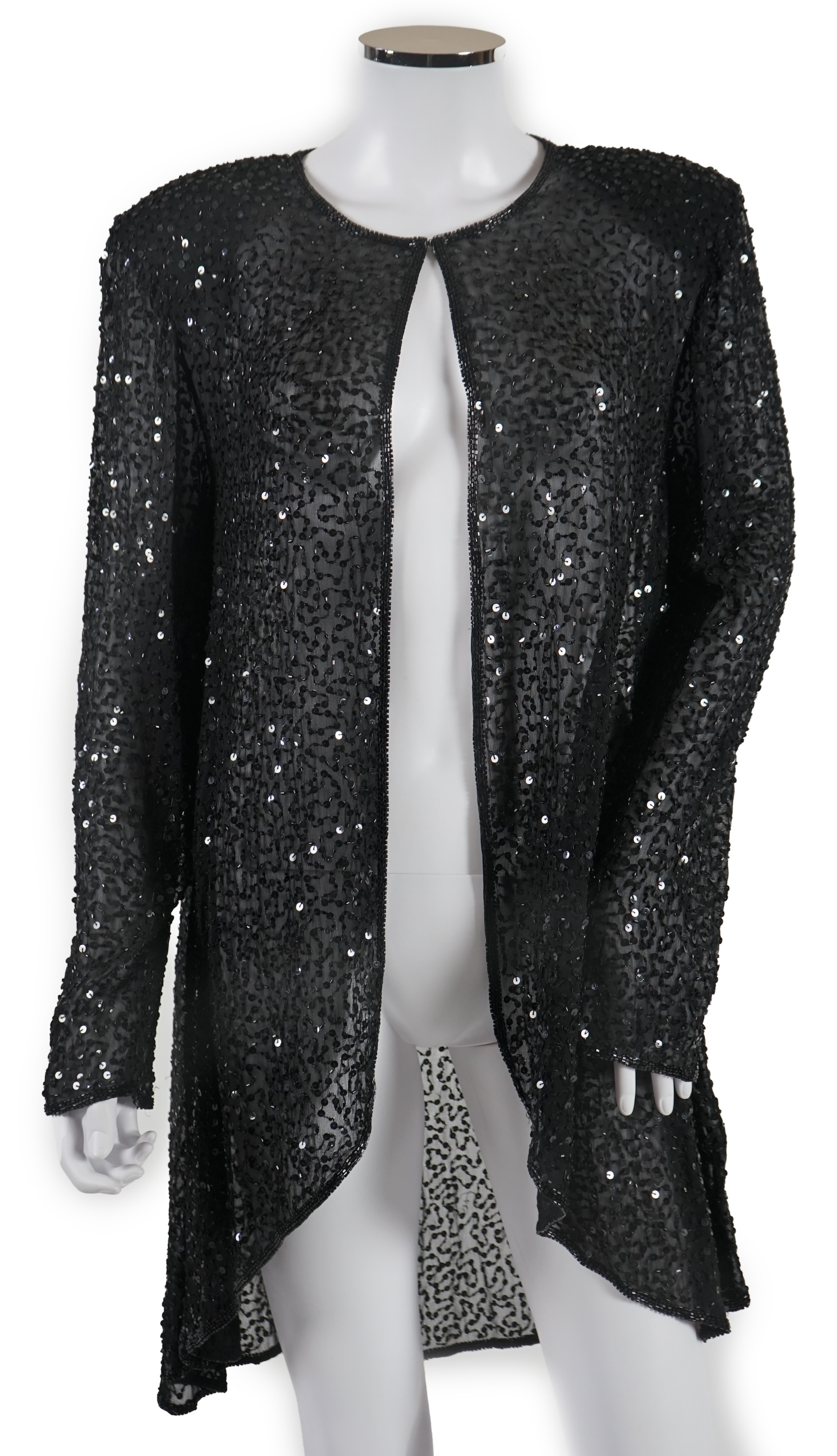 A selection of lady's evening tops and jackets, all black with sequin embellishments, six pieces in total. Proceeds to Happy Paws Puppy Rescue